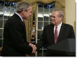 President George W. Bush shakes the hand of outgoing Secretary of State Donald Rumsfeld Wednesday, Nov. 8, 2006, in the Oval Office where the President announced the Secretary's resignation and his intention to nominate Dr. Robert Gates as successor. 